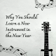 Why You Should Learn a New Instrument in the New Year. Photo contains images of staff music and a guitar.
